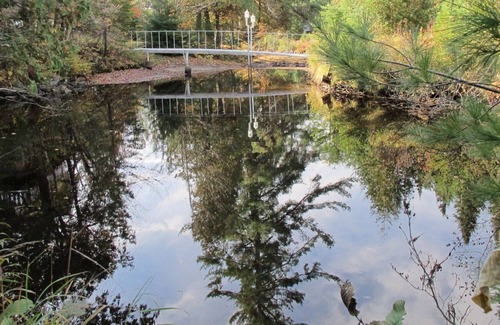 Sainte-Marguerite-du-Lac-Masson House | A Swiss Chalet on Doncaster river + Private Mini Island