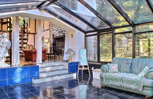 Sainte-Marguerite-du-Lac-Masson House | A Swiss Chalet on Doncaster river + Private Mini Island