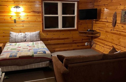 Warsaw Cabin | Cabin 4 - Reel and Trigger