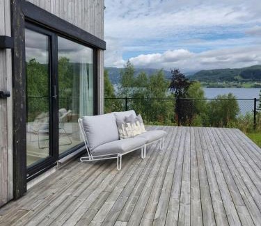 Hjelmeland House | Cabin By The Fjord With Rooftop Terrace On Randøy