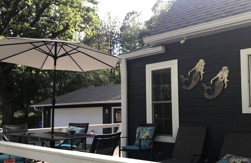 Spirit Lake House | Cabin located off of East Okoboji lake, close to barefoot 🦶 bar!!!