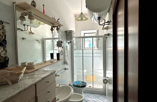 Le Forna Apartment | Cala Feola holiday apartment with patio and terrace.