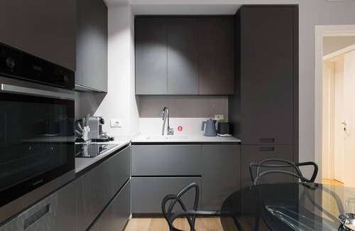 Historic Center Apartment | Caldarese Apartment with Balcony by Wonderful Italy