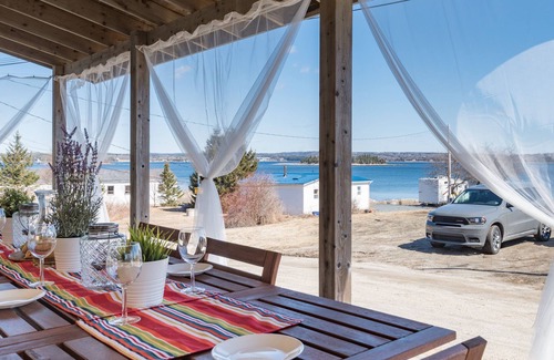 Western Shore House | Calm and Relaxing sunrise Oceanview of Oak Island. 2 "Master" bedrooms.