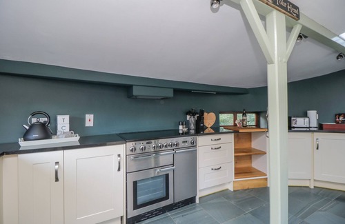 Stainburn Cottage | CAMERTON HALL COTTAGE, pet friendly, with open fire in Cockermouth