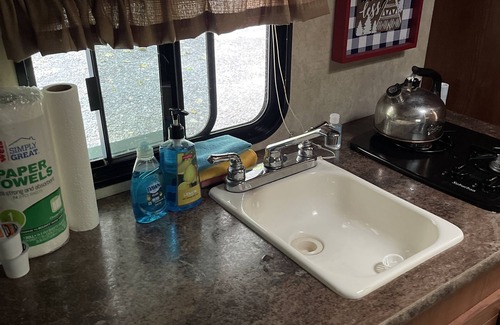 Benton House | Camper next to Rickett’s glen