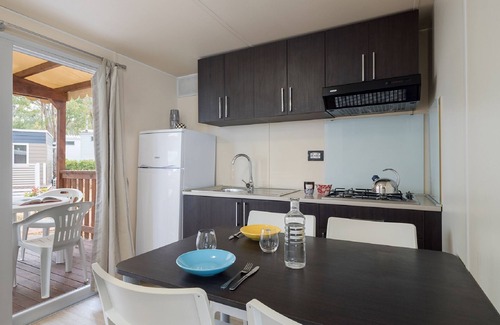 Fertilia House | Camping Village Laguna Blu by Interhome