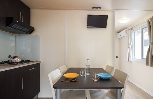 Fertilia House | Camping Village Laguna Blu by Interhome