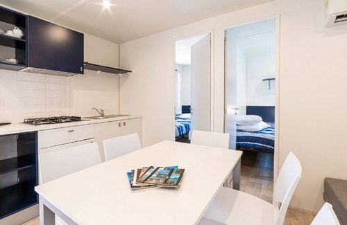 Fertilia House | Camping Village Laguna Blu by Interhome