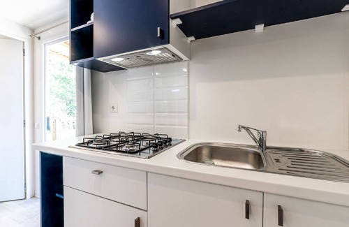 Fertilia House | Camping Village Laguna Blu by Interhome