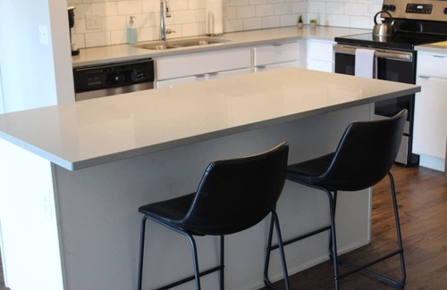 Ames Apartment | Campustown Flat near Jack Trice with Firepit