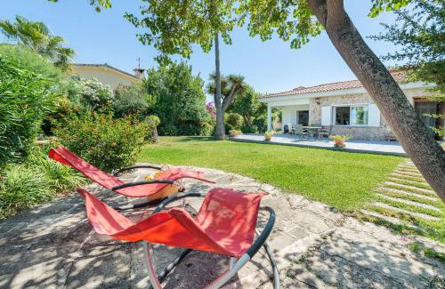 Les Palmeres Villa | Can Malondra, villa para 8 con piscina y jardines