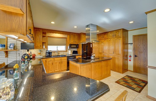Pearl Beach House | Canal-Front Clay Township Gem: Boat & Jet Ski Lift
