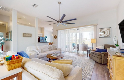 Pinehurst House | Canal-front home with private heated pool, patio, canal views & bikes