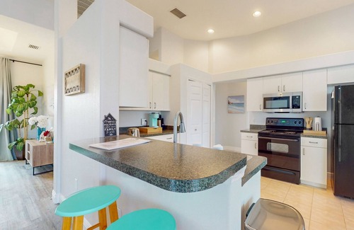 Pinehurst House | Canal-front home with private heated pool, patio, canal views & bikes