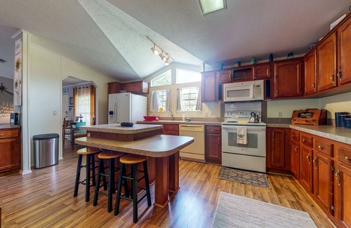 Astor House | Canal-Front Home with Private Covered Boat Dock & Waterfront Screened Porch