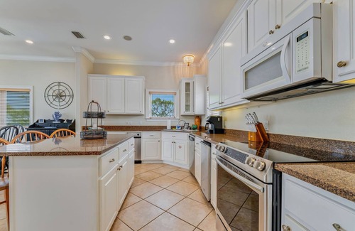 Plantation House | Canary on the Bay - Luxury Bayfront Home, Pet-Friendly, with Private Pool & Dock