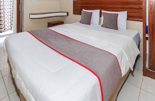 Pinang Hotel | Capital O 93371 Pelangi Residence 5
