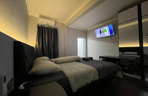 Padang Hotel | Capital O 94208 Homtel Menza plantinum