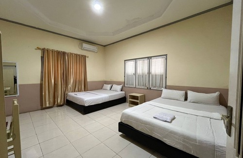 Padang Hotel | Capital O 94240 Asoka Syariah
