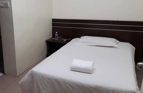 Padang Hotel | Capital O 94240 Asoka Syariah