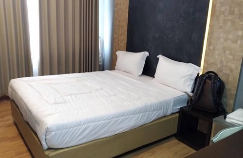 Bekasi Hotel | Capital O 94368 Kingstone Hotel