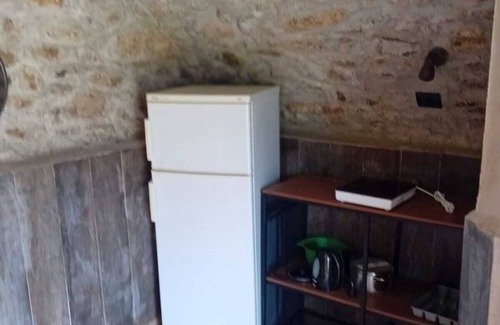 Bene Lario RV Rental | Caravan 'Glamping C Selva Tenda Ciliegio' with Mountain View and Shared Garden