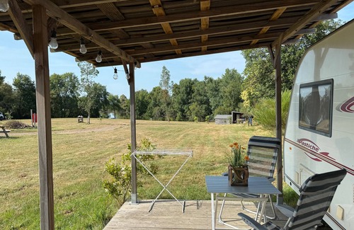 Champsac RV Rental | Caravan 'Vue Sur L'étang' with Lake View, Shared Pool and Private Terrace