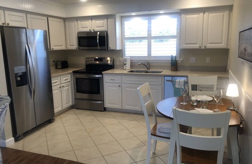 Englewood Apartment | Caribbean Tiki Hut relaxation. Enjoy the Islands & Boca Grande without the costs