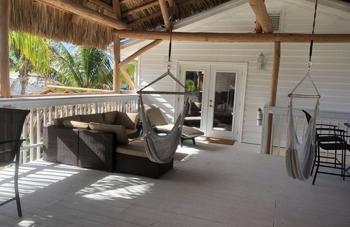 Englewood Apartment | Caribbean Tiki Hut relaxation. Enjoy the Islands & Boca Grande without the costs