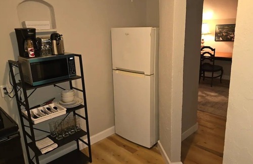 Fayette Condo | Carriage House by CMU - Upper Condo - Kitchen, King Bed, 65" TV Fast WiFi & AC