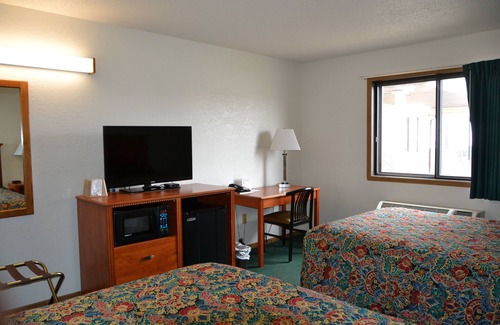 Carrington Hotel | Carrington Inn & Suites