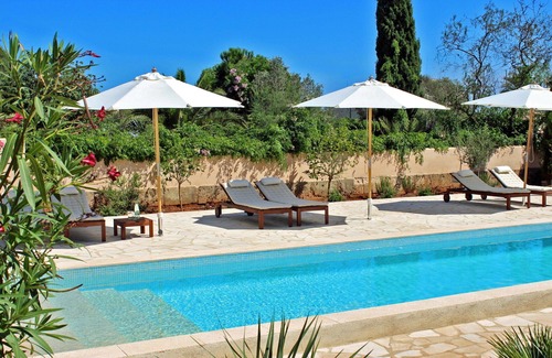 Es Llombards House | Casa 3 Leones - renovated finca-style townhouse, patio, garden and long pool