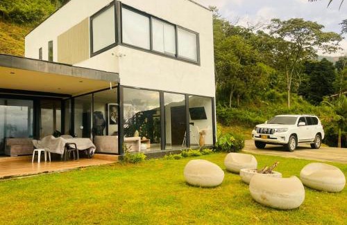 Copacabana Villa | Casa Blanca Cabaña de lujo rodeada de naturaleza