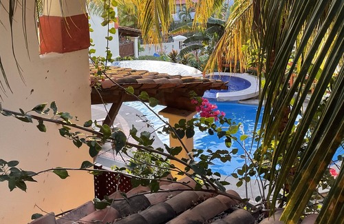 Coco Sunset Hills Condo | Casa Buena - Relaxing poolside retreat