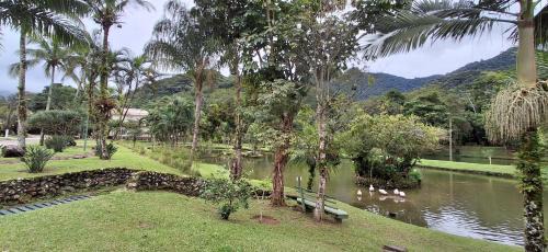 Horto House | Casa em Condomínio com Piscina e Lago em UBATUBA