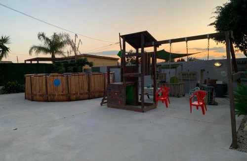 Deltebre House | Casa Enric , con zona infantil, piscina y parking privado
