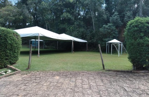 Jardim Primavera House | Casa Guacuri - Casa de temporada e eventos - apartamentos com suítes - Piscinas e Amplo Estacionamento