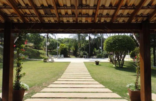 Jardim Primavera House | Casa Guacuri - Casa de temporada e eventos - apartamentos com suítes - Piscinas e Amplo Estacionamento