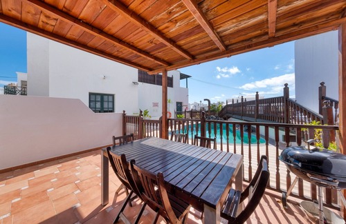 Punta Mujeres Ski Chalet | Casa Hibiscus - Shared Pool and BBQ - Close to Seafront Promenade By Lanzarote Vacation Homes