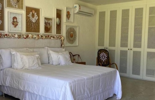 Passo de Camaragibe House | Casa Martha Medeiros, art and love in every detail!