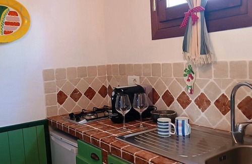 Loiri Porto San Paolo House | Casa Perella B: A graceful cottage surrounded by the greenery, with Free WI-FI.