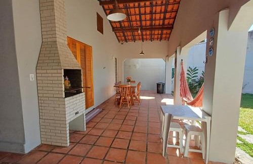 Estufa I House | Casa Temporada Ubatuba próxima à praia, check-in e out flexíveis com 5 vagas na garagem, wifi