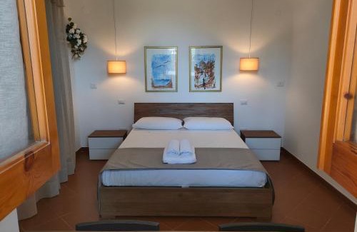 Cozze House | Casa Vacanze "Il Corallo"