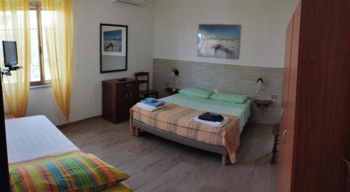 Carbonia Bed & Breakfast | Casa Vacanze"Il Bouganville"