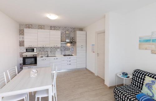 Porto Pino Apartment | Case Vacanze "Bianco Mare"