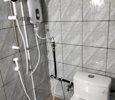 Sri Aman House | Cassava Horbit Room include Aircon