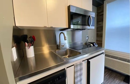 South Lethbridge Apartment | Central Farmhouse-Style Micro Apartment