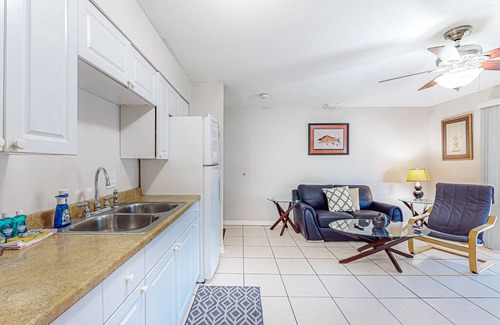 Largo Condo | Centrally located condo with heated pool, balcony, washer/dryer & central AC
