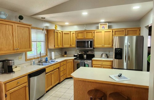 Fargo House | Centrally located home blocks from Bluemont lake